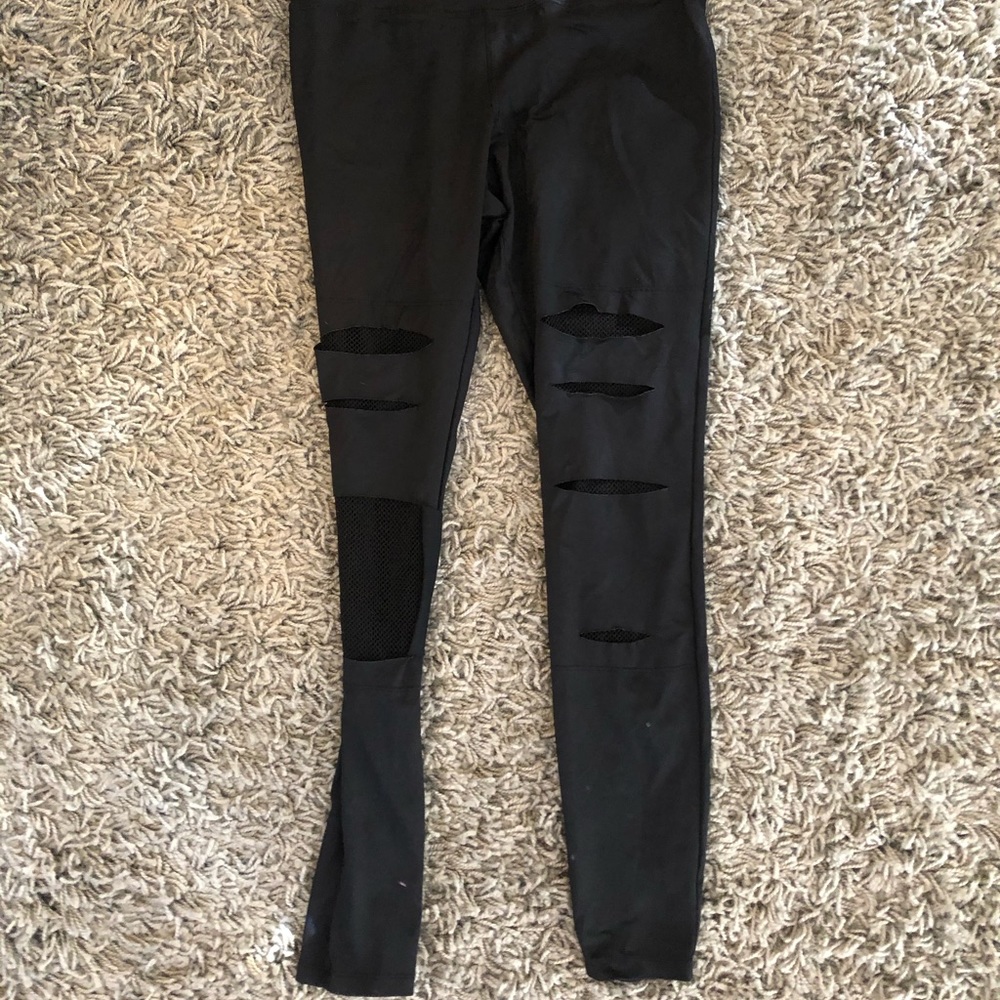 Ripped net leggings